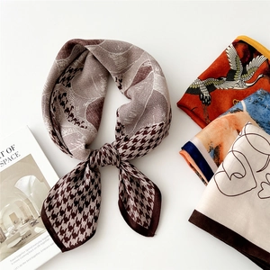 Chic houndstooth cotton linen square scarf set displayed on a fashion magazine background