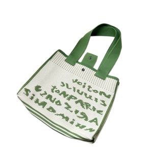Minimalist knit tote bag with green contrast patterns and magnetic buckle closure
