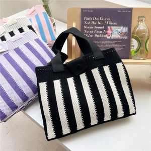 Striped knit tote bag with minimalist weave and button closure for casual fashion