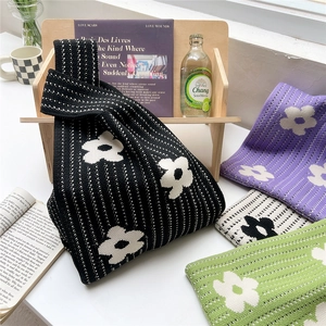 Minimalist flower pattern knitted tote bag with knotted handle in various pastel colors