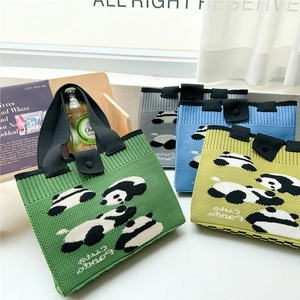 Handmade green knitted tote bag with cute panda patterns in various colors for daily use