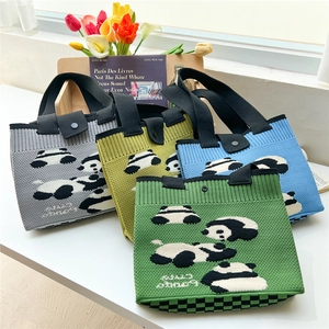 Detail of cute panda knit bags in four colors with checkerboard patterns and button closures