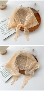 Detail of apricot lace hair scarf showing intricate crochet patterns and delicate tie straps