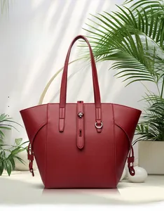 Detailed view of the dark red tote bag with lychee grain leather texture and metal buckle