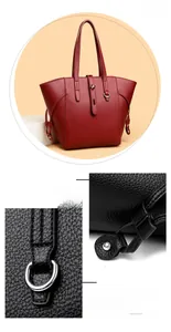 Close-up of litchi grain leather texture and metallic buckle on a vintage tote bag