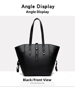 Front view of black pebble leather tote bag with metallic buckle and side drawstring detail