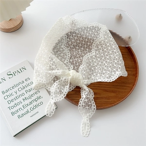 Elegant white lace triangular headscarf with geometric crochet patterns and wavy lace edges