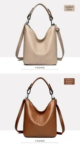 Detail view of crocodile pattern textures in apricot and brown on large bucket bags