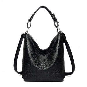 Black crocodile embossed leather bucket bag with top handle and silver-tone hardware details