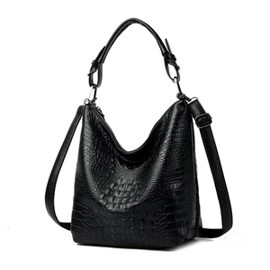 Large black crocodile pattern bucket bag with silver hardware and shoulder strap
