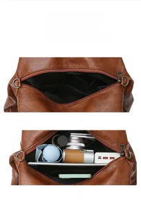 Vue intérieure du sac à bandoulière marron montrant sa grande capacité de rangement