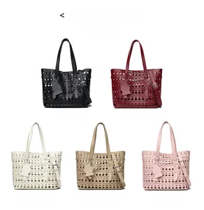 Detailed display of hollowed-out tote bags in five elegant colors with cat charms