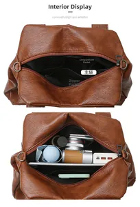 Vue détaillée des compartiments intérieurs spacieux du sac à main vintage en cuir brun