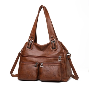 Sac bandoulière vintage marron en similicuir avec plusieurs poches zippées et poignées