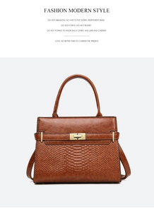 Detailed view of brown PU leather handbag featuring snakeskin texture and gold turn-lock