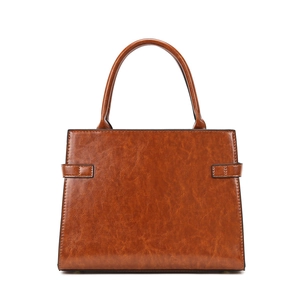 Vintage embossed brown leather handbag with double handles and decorative side buckles