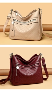 Close-up of quilted PU leather texture and metal zipper details on women's crossbody bags