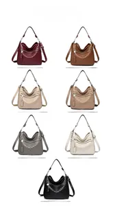 Detailed grid view showcasing seven color options for the quilted hobo shoulder bag