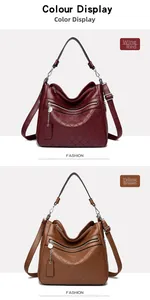 Detail view of multi-layer soft leather tote bags in burgundy and yellow-brown colors
