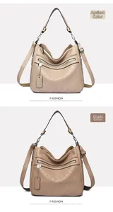 Detail of soft leather bags in apricot and khaki featuring rhombus quilting and silver chain