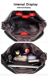 Internal display of the multi-compartment leather bag showing its large storage capacity