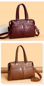 Detail of burgundy and brown lychee grain handbags with dual front silver zippers
