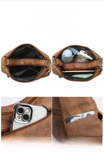 Detailed interior of vintage brown soft leather bag showing large storage capacity
