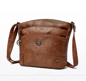Sac bandoulière marron vintage en similicuir avec trois couches et compartiments zippés
