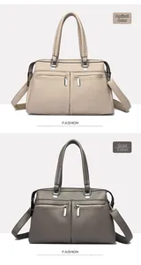 Detalle de la textura granulada en los bolsos beige y gris con detalles de cremallera
