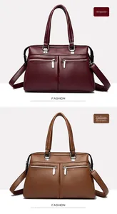 Detalle de la textura de cuero granulado en bolsos burdeos y marrones con asas de metal