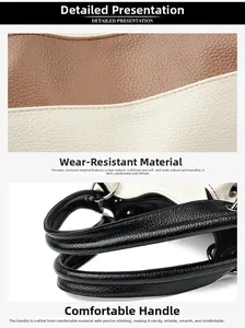 Detail of lychee pattern leather handbag with contrast stitching and sturdy handle