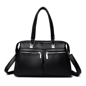 Black pebbled leather tote bag with multi-zipper pockets and durable double handles