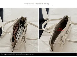 Internal view of white crocodile embossed tote bag showing large main compartment capacity