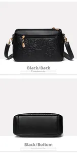 Detailansicht der Rückentasche und des Bodens der geprägten Lederhandtasche in Schwarz