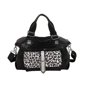 Black faux crocodile leather tote bag with leopard print front pocket and silver trim