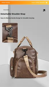 Detail of detachable nylon strap and side pocket on brown leather sports duffel bag