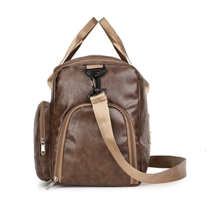 Large capacity dark brown travel duffel bag with leather texture and adjustable shoulder strap