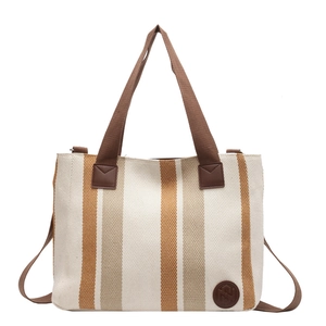 Gestreifte Canvas-Einkaufstasche mit braunen Henkeln im minimalistischen Retro-Stil