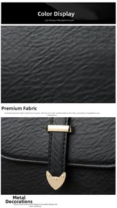 Détail du sac à main en cuir noir texturé avec fermoir en métal doré brillant