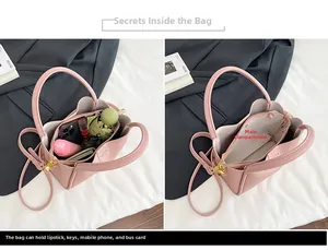 Détails de l'espace interne et capacité du sac seau en cuir rose avec rangement