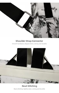 Close-up of white leather backpack showing silver metal buckles and reinforced stitching