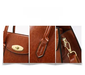 Detail shot of brown oil wax leather texture with gold twist lock and sturdy stitching