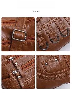 Detail of woven texture with adjustable metal buckle and litchi grain leather on shoulder bag