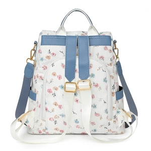 Minimalist white floral backpack for women with blue leather accents and large capacity