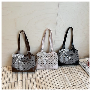 Detailed comparison of three vintage leather underarm bags with lace pearl bow accents
