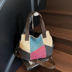 Color-block canvas tote bag with adjustable shoulder strap for daily commuting