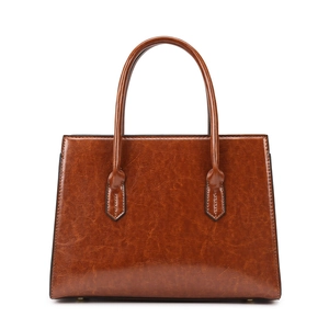 Classic vintage brown tote handbag in polished wax leather with twin top handles