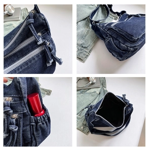 Detail view of denim crossbody bag with multi-zipper layers and frayed tassel pulls