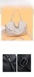 Close-up of high quality lychee pattern leather and metal zipper on this tote bag