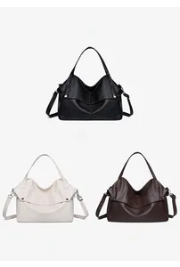 Three large tote bags in black, beige, and coffee brown with pebbled leather texture
